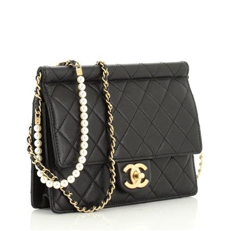 chanel chic pearl bag|Chanel bag with pearls strap.